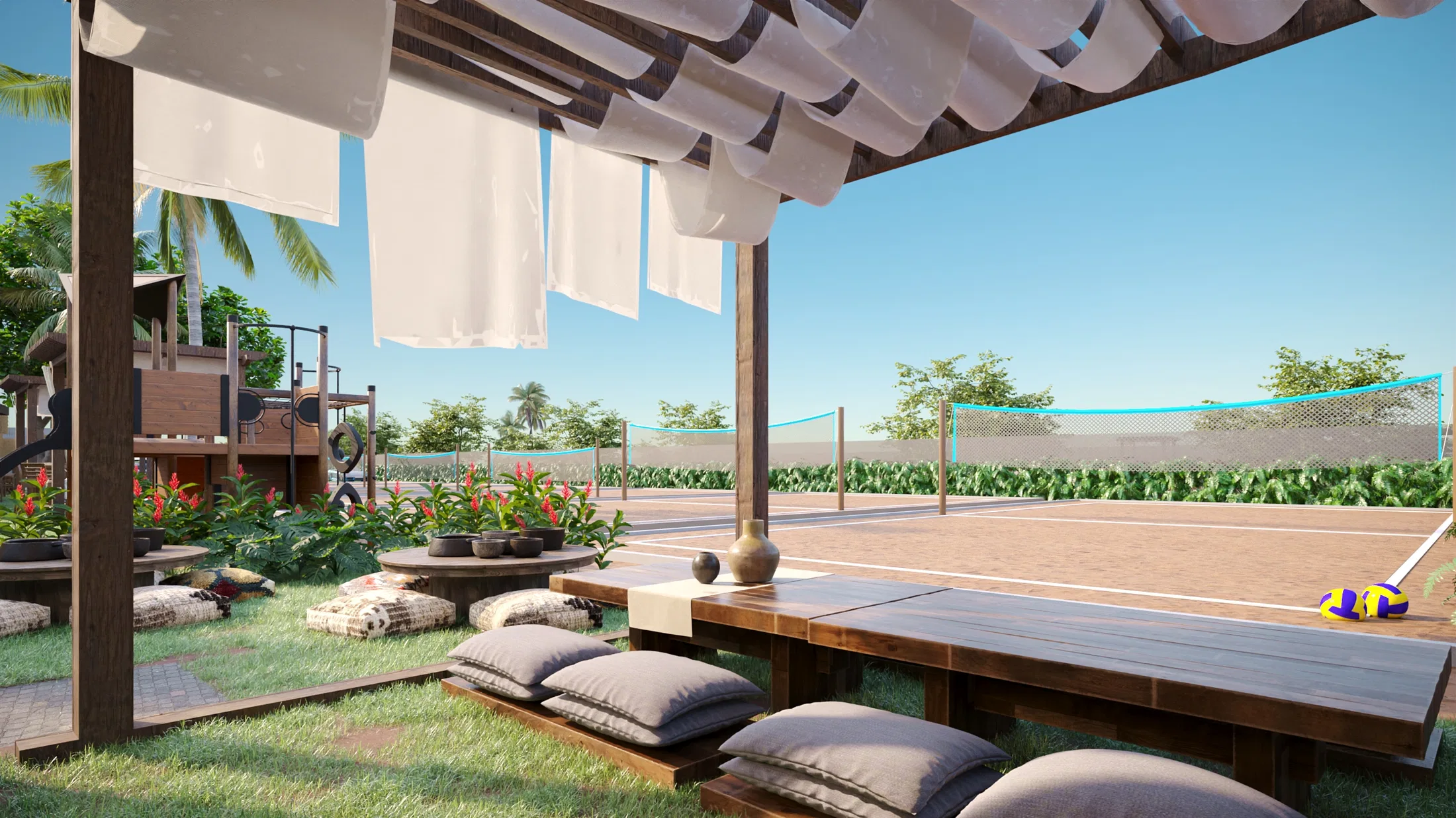 Lounge deck with a fluttering fabric pergola, poufs and cushions over wood, a playground alongside and a sand court with a ball beyond