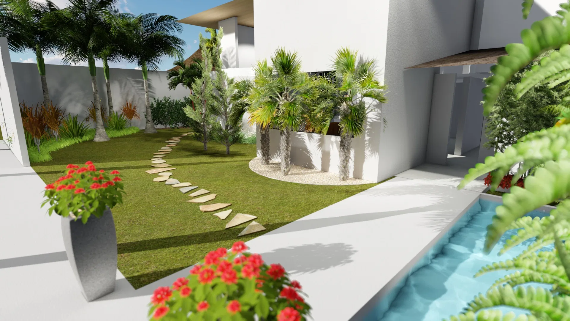 Side garden with a winding stone path across the lawn, palms and tall planters of red flowers, a pool to the right