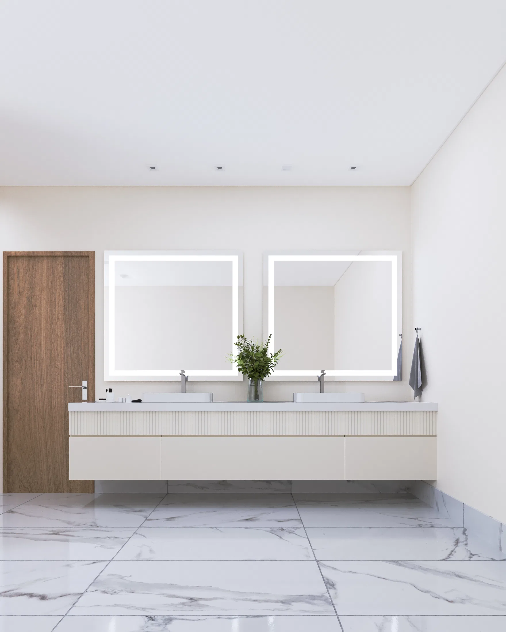 Bathroom with a double marble vanity and two white basins beneath backlit mirrors, a fluted cream base, a wood door and a marble floor
