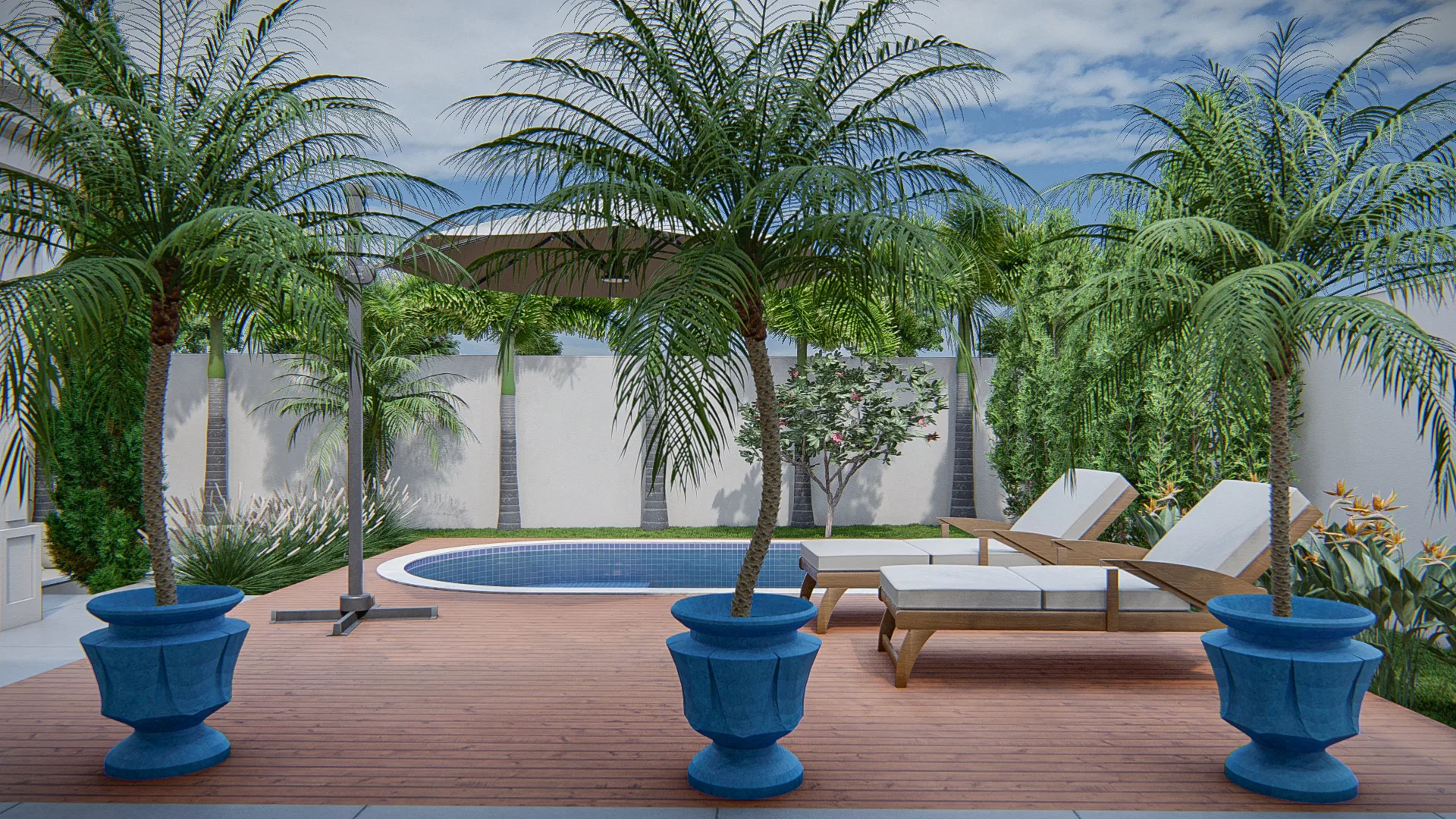 Wood pool deck with palm trees in blue planters, lounge chairs and a retractable pergola in the background