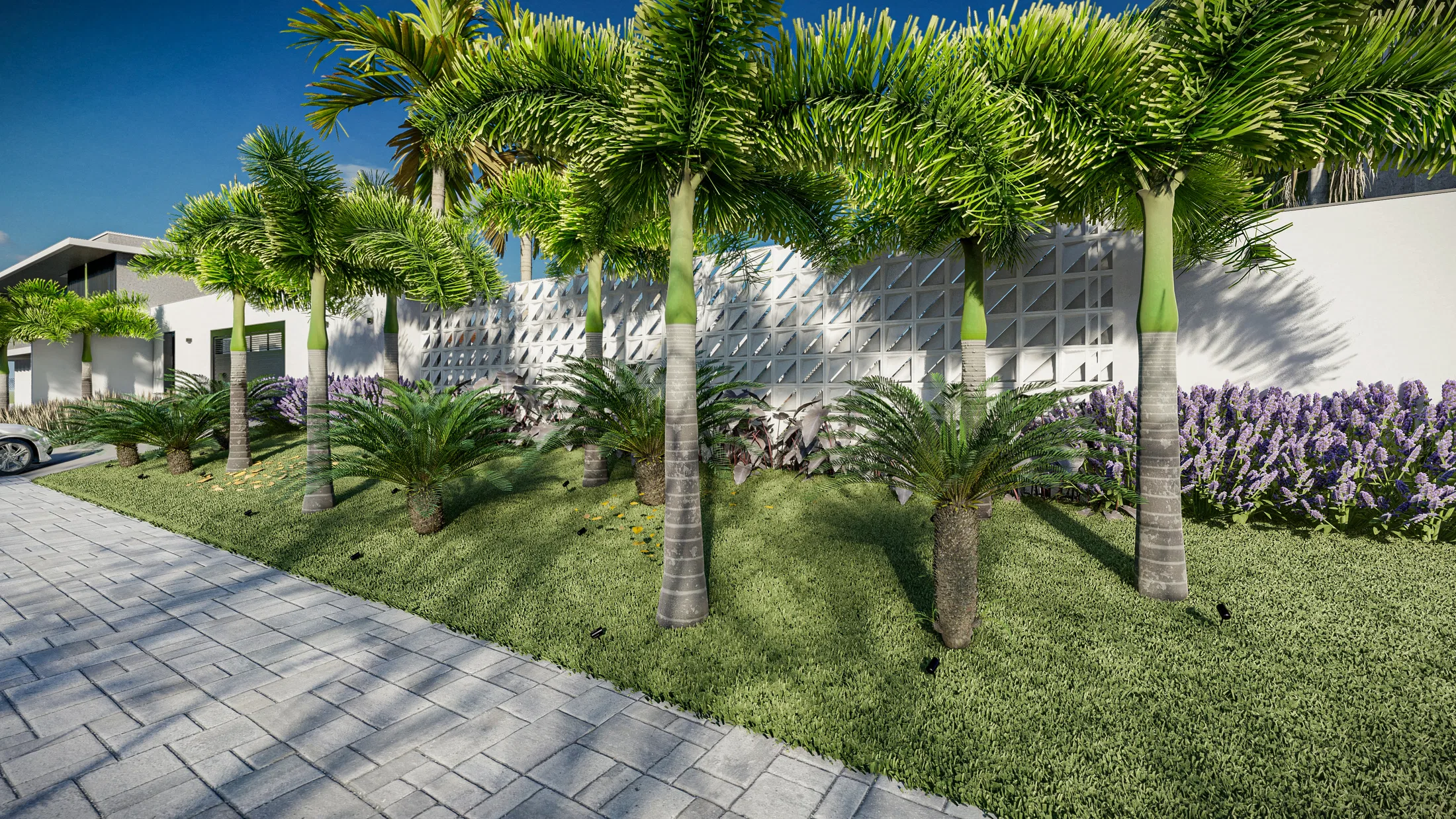 Side planting bed by the driveway with sago palms, purple flowers and a perforated wall behind