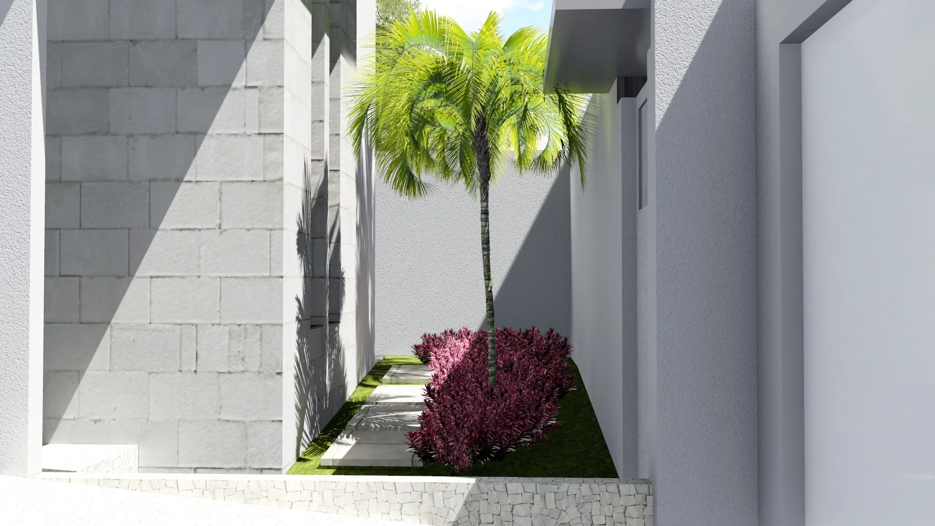 Narrow corridor between an exposed-block wall and white render, with a central palm and a bed of deep-red foliage
