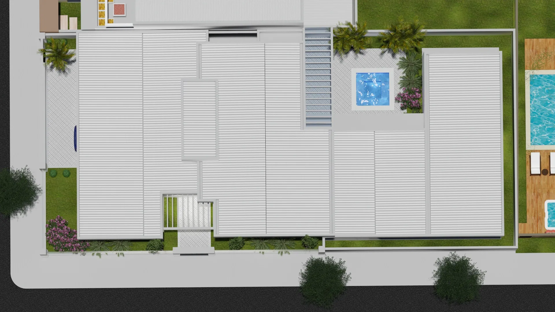 Aerial view of the site showing rooftops, the pool and landscaping around the residence