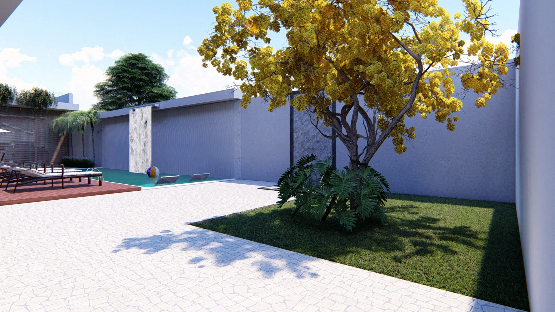 Paved courtyard with a yellow-flowering tree and a mass of foliage at its base, a table-tennis table and loungers beyond