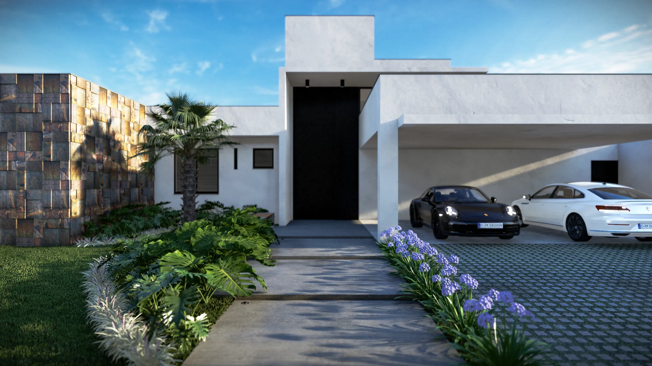 White single-storey house facade with a black gate, a paver driveway holding two cars and a border of purple agapanthus along the entry.