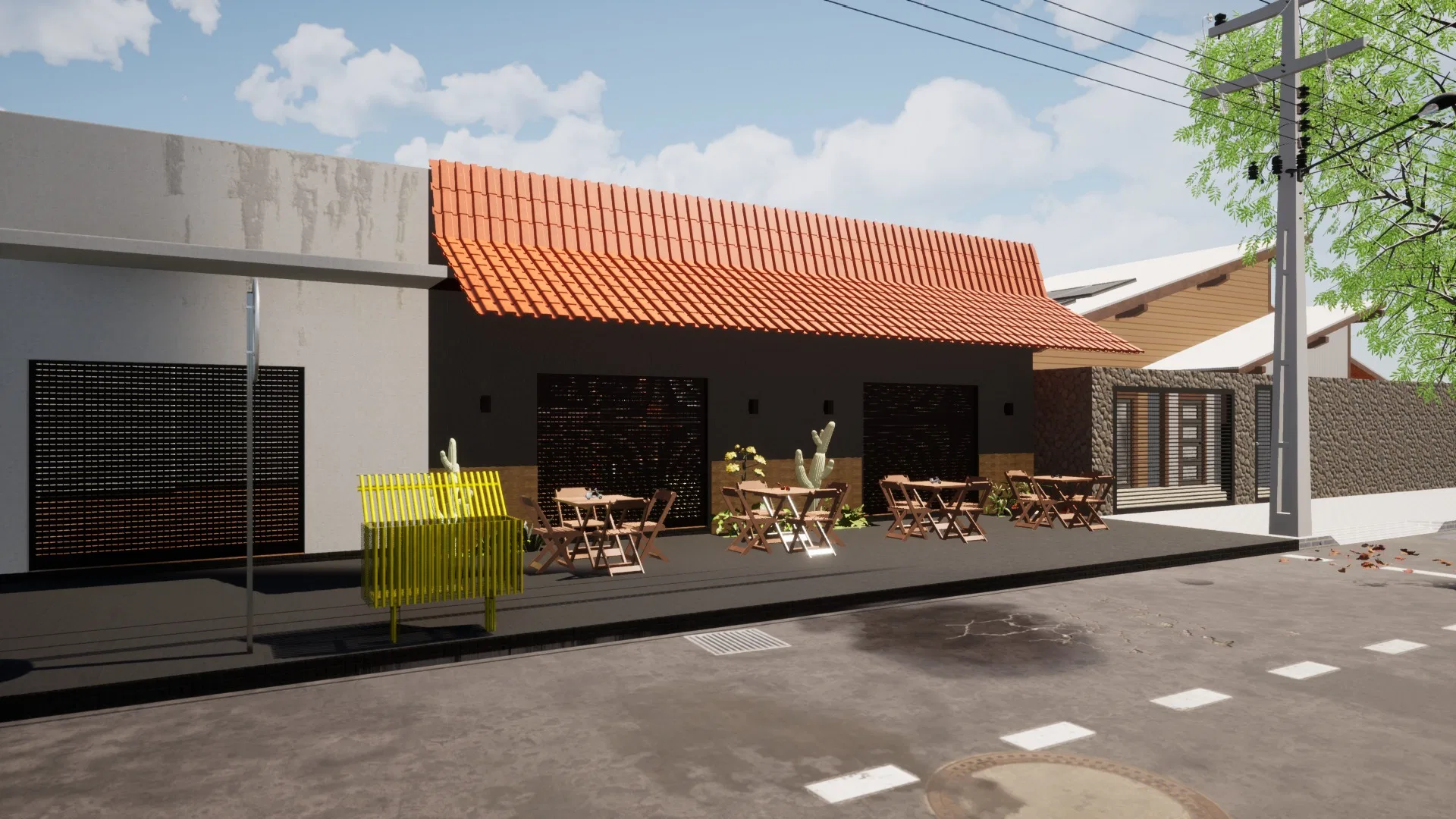 The same façade by day under a blue sky, orange ceramic-tile roof, dark wall with openings and wooden furniture on the patio