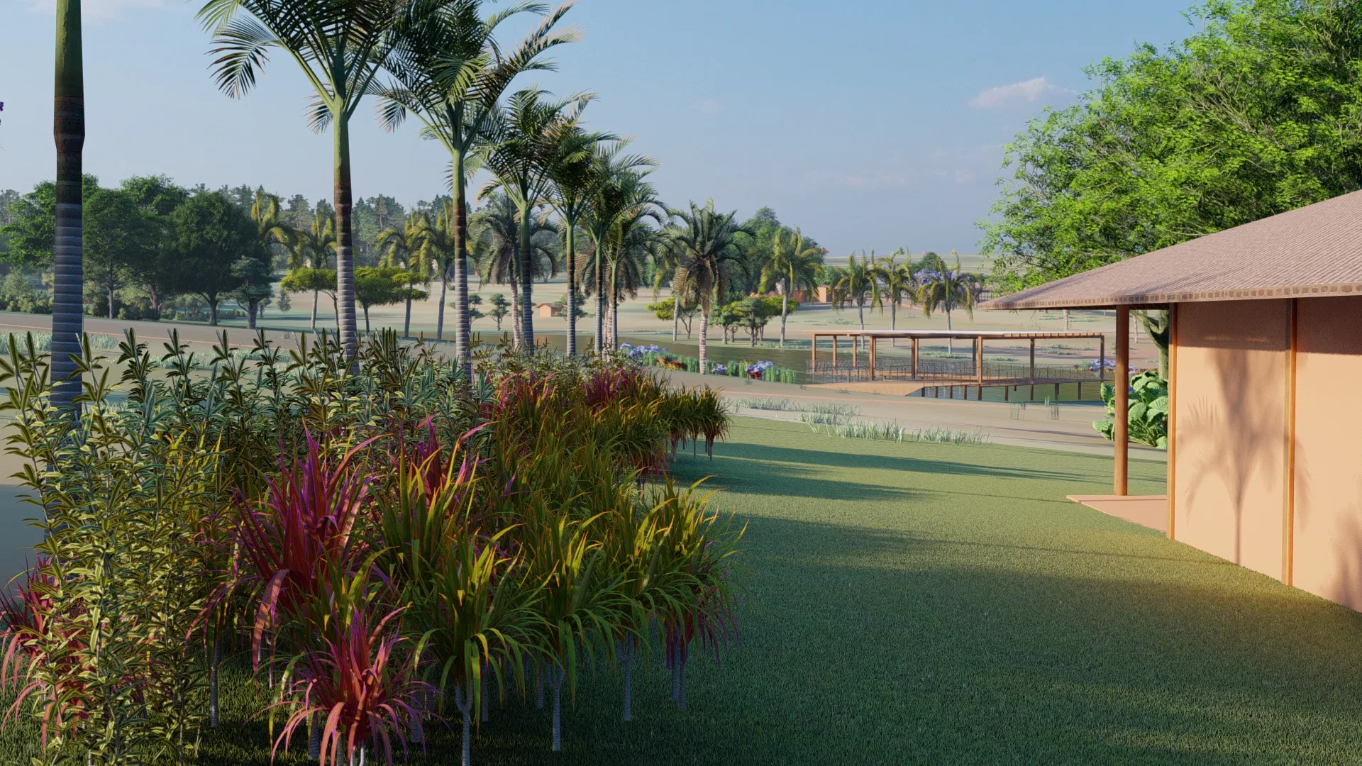 Lakeside garden path with a bed of wine-toned and green foliage, palm trees in the background and the roof of a support pavilion to the right