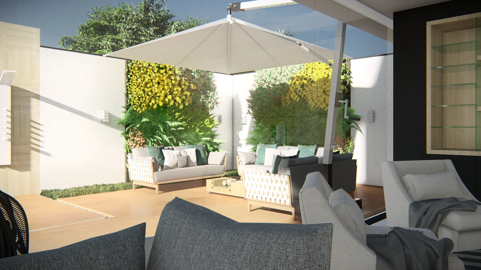 Covered outdoor lounge under a large umbrella with white sofas and upholstered armchairs beside a vertical garden, opening onto a dark-cabinetry interior