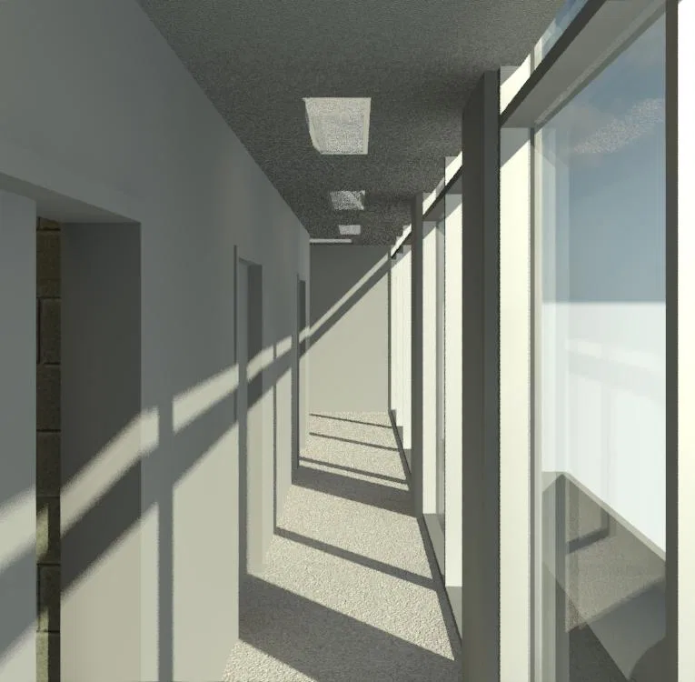 Narrow corridor with a glass wall to the right letting in strong daylight, doors along the wall and ceiling fixtures
