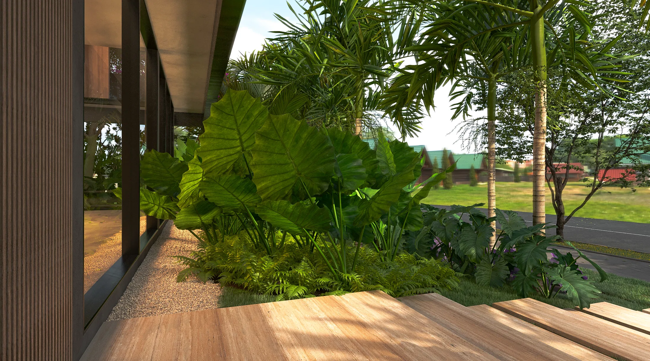 Wooden side deck running along the dark slatted facade, with a mass of tropical leaves and open lawn beyond