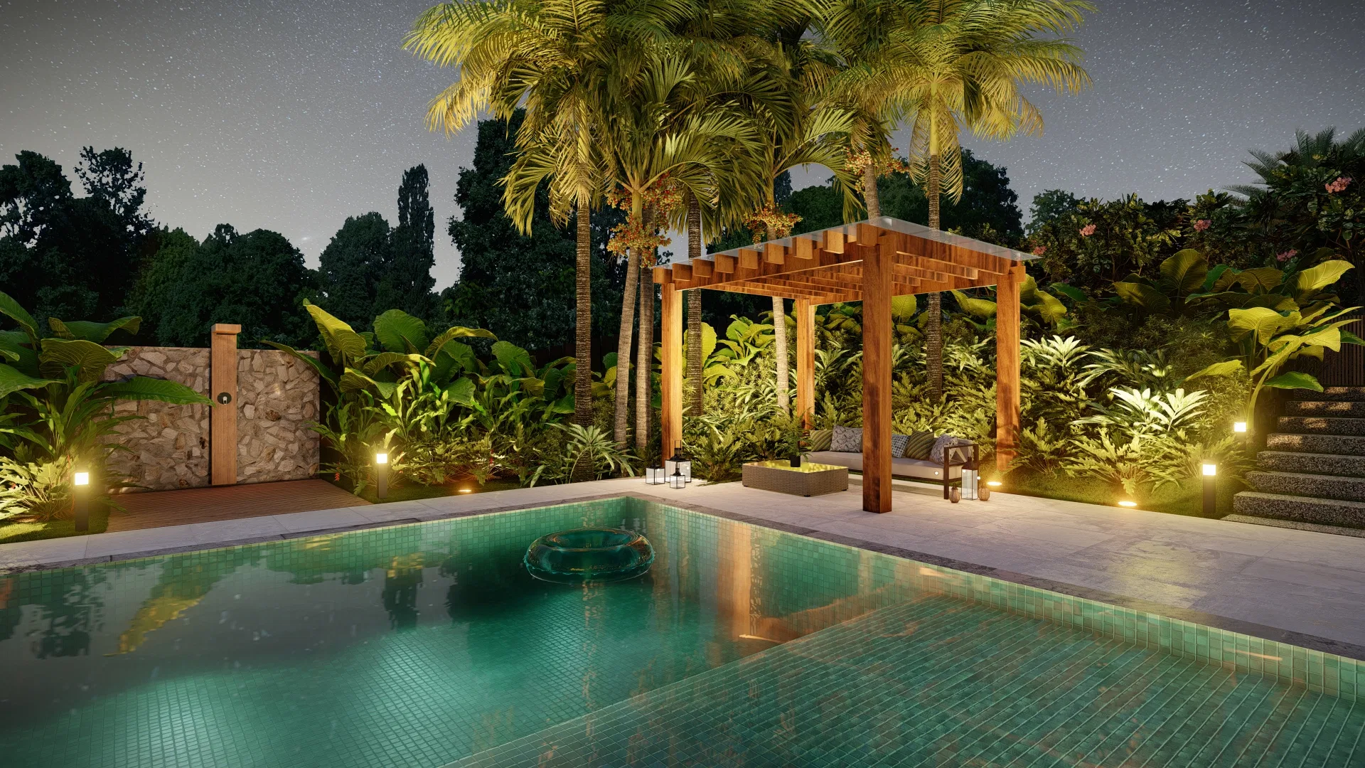 Pool with a wood pergola surrounded by tropical planting, a covered seating nook with cushions and lit lanterns at night