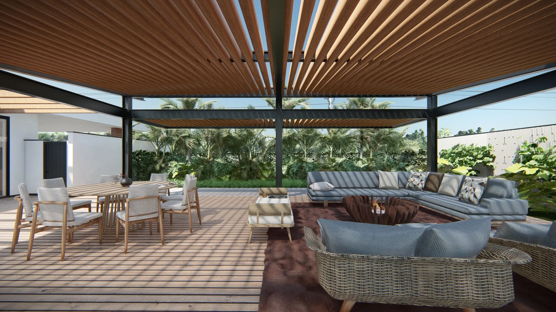 Wood pergola-covered deck with an outdoor dining table, lounge sofas and a view of a tropical garden beyond